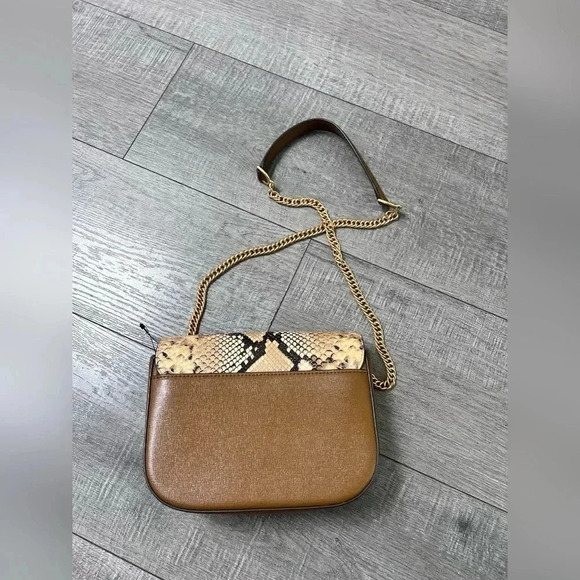 Tory Burch Robinson Exotic Convertible
Shoulder Bag $598 - Picture 9 of 11